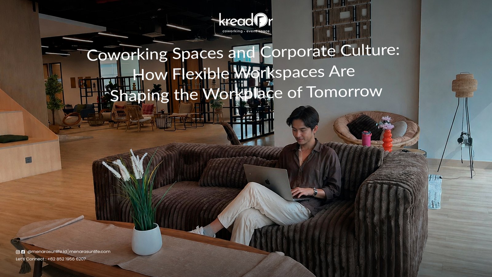 A professional working on a laptop in a comfortable, modern coworking space at Kreador, surrounded by stylish furniture and a relaxed atmosphere.