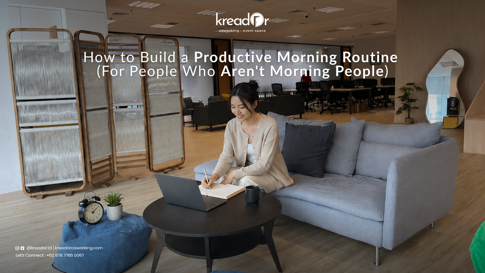 A professional starting a productive morning routine at Kreador coworking space Jakarta with coffee and a laptop