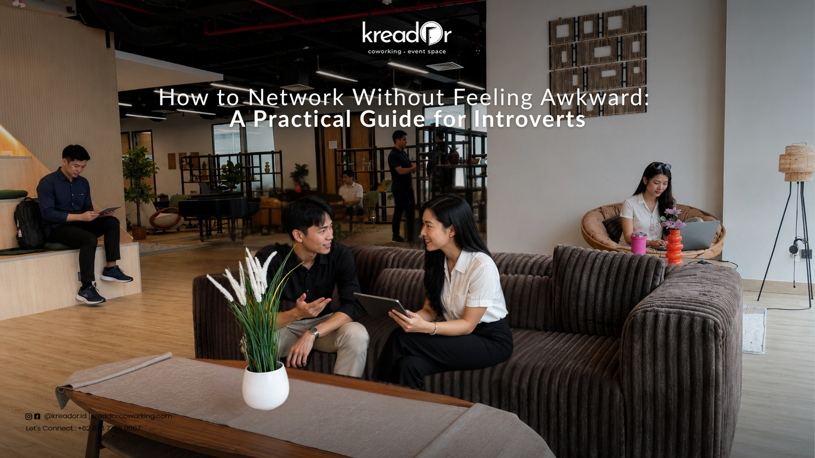 Introvert professional networking naturally at Kreador coworking space Jakarta in a relaxed lounge setting